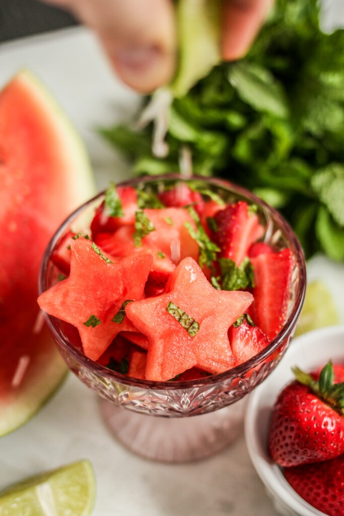 Squeeze lime over watermelon berry salad