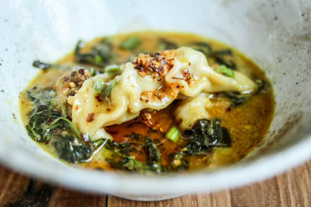 Trader Joe's Dumpling Bake in Yellow Thai Sauce in a bowl